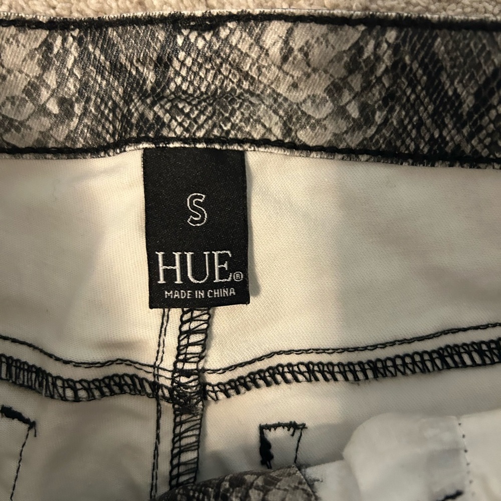 HUE faux leather animal print slim leg pant.